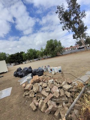 Junk removal job with debris ready for pickup